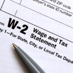 The,Pen,Lies,On,The,Tax,Form,W-2,Wage,And